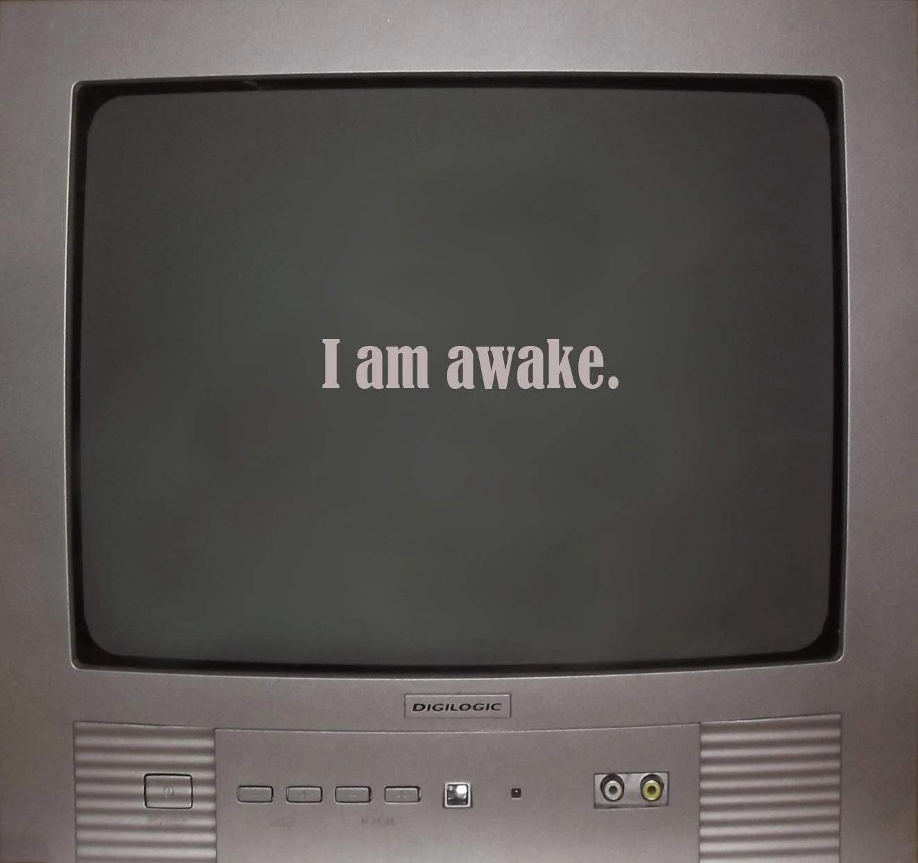 Deadmall television displaying the words I am awake